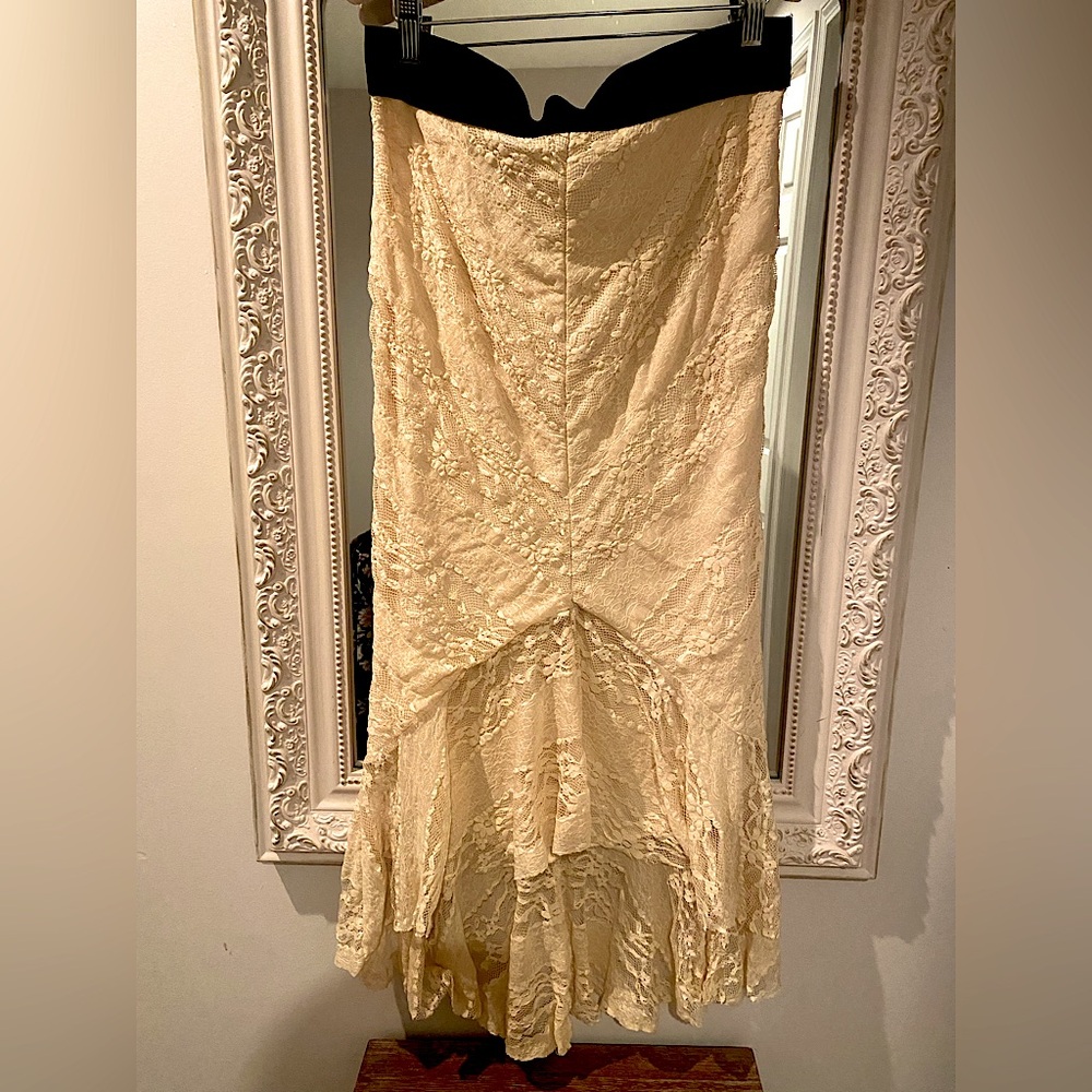 Brand new from our Boutique! Lace lightly lined high low cream skirt Large